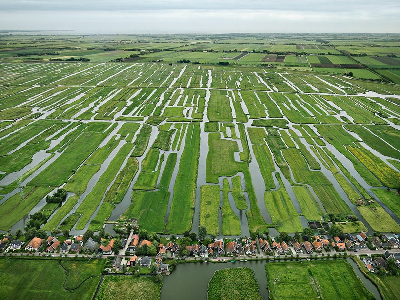 An array of polders and dikes in the countryside of Grootschermer, the Netherlands. Image by Edward Burtynsky.